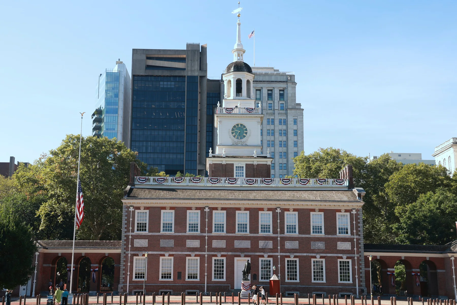A red-brick historic building with a clock tower in Philadelphia.